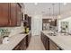 Well-appointed kitchen featuring stainless steel appliances, generous counter space, and abundant cabinet storage at 24840 S 195Th St, Queen Creek, AZ 85142