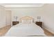 Bright and airy main bedroom featuring a king-sized bed, neutral decor, and soft lighting at 24840 S 195Th St, Queen Creek, AZ 85142