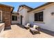 Charming outdoor seating area with pavers and comfortable furniture, perfect for enjoying the pleasant weather at 24840 S 195Th St, Queen Creek, AZ 85142