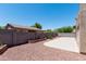 Low maintenance backyard with patio, gravel, and desert landscaping at 2527 E Remington Pl, Chandler, AZ 85286