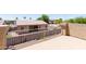 Outdoor patio featuring a tan metal railing with neighborhood and backyard views at 2527 E Remington Pl, Chandler, AZ 85286