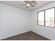 Bedroom featuring carpet flooring, neutral paint, and a window at 2527 E Remington Pl, Chandler, AZ 85286