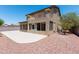 The back of the home features a large patio and covered patio area on the first floor at 2527 E Remington Pl, Chandler, AZ 85286