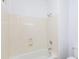 Bathtub and shower combo with a neutral design and updated fixtures at 2527 E Remington Pl, Chandler, AZ 85286