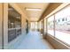 Bright sunroom featuring tile flooring, multiple windows and views of the backyard at 2527 E Remington Pl, Chandler, AZ 85286