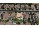 An aerial perspective reveals a property with a refreshing private pool surrounded by beautifully landscaped yards at 2541 E Carob Dr, Gilbert, AZ 85298