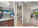 Bathroom featuring single sink, bathtub, toilet and linen closet at 2541 E Carob Dr, Gilbert, AZ 85298