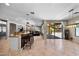 Open-concept kitchen with a large island, granite countertops, and stainless steel appliances at 2541 E Carob Dr, Gilbert, AZ 85298