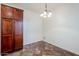 Cozy dining area featuring a pantry and tiled floors at 26505 N Babbling Brook Dr, Phoenix, AZ 85083