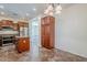 Eat-in kitchen features stainless appliances, wood cabinets, and a large pantry at 26505 N Babbling Brook Dr, Phoenix, AZ 85083