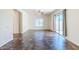 Living area showcasing tile floors, neutral paint, ceiling fan and sliding door to outdoor patio at 26505 N Babbling Brook Dr, Phoenix, AZ 85083
