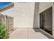 Enclosed patio with concrete flooring and sliding glass door for indoor outdoor living at 26505 N Babbling Brook Dr, Phoenix, AZ 85083