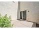 Enclosed patio with concrete flooring and sliding glass door for indoor outdoor living at 26505 N Babbling Brook Dr, Phoenix, AZ 85083