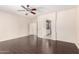 Bedroom with laminate flooring, ceiling fan and bathroom with stylish vanity and tile shower at 2741 E San Tan St, Chandler, AZ 85225