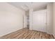 Cozy bedroom with wood-look floors and sliding closet doors providing ample storage at 2741 E San Tan St, Chandler, AZ 85225