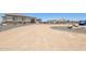 Spacious single-story home featuring desert landscaping and an extended circular driveway at 28156 N Edwards Rd, San Tan Valley, AZ 85143