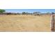 Well-maintained horse property with multiple pens and riding area, perfect for equestrian enthusiasts at 28156 N Edwards Rd, San Tan Valley, AZ 85143