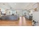 Open floor plan featuring living room and kitchen area with hardwood floors at 28156 N Edwards Rd, San Tan Valley, AZ 85143