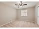 Cozy bedroom with neutral walls, one window, and plush carpeting throughout at 28806 N 23Rd Ln, Phoenix, AZ 85085