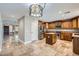 Kitchen with stainless steel appliances, a center island, and tile flooring at 28806 N 23Rd Ln, Phoenix, AZ 85085