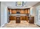 Gourmet kitchen featuring custom cabinetry, granite countertops, and stainless steel appliances at 28806 N 23Rd Ln, Phoenix, AZ 85085