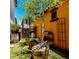Cozy backyard features artifical grass and barrel planters at 2944 N Brighton --, Mesa, AZ 85207
