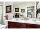 Bathroom with double sinks, vanity, and decorative details at 2944 N Brighton --, Mesa, AZ 85207