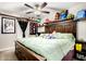 Spacious bedroom featuring a ceiling fan and decor at 2944 N Brighton --, Mesa, AZ 85207
