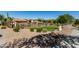 Beautiful community pool area with desert landscaping, cabana and lounge chairs on a sunny day at 2944 N Brighton --, Mesa, AZ 85207