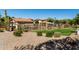 Beautiful community pool area with desert landscaping, cabana and lounge chairs on a sunny day at 2944 N Brighton --, Mesa, AZ 85207