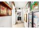 Hallway decorated with framed photos and artwork leading to office at 2944 N Brighton --, Mesa, AZ 85207
