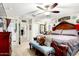 Bright Primary bedroom boasts a ceiling fan, sitting area and access to the ensuite bathroom at 2944 N Brighton --, Mesa, AZ 85207