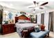 Comfortable Primary bedroom featuring a ceiling fan, wooden furniture and a cozy sitting area at 2944 N Brighton --, Mesa, AZ 85207