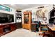 Inviting office features a gun cabinet and desk area at 2944 N Brighton --, Mesa, AZ 85207