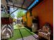 Charming covered patio area with outdoor decor and seating at 2944 N Brighton --, Mesa, AZ 85207