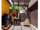Covered patio area featuring a fireplace and wood shed at 2944 N Brighton --, Mesa, AZ 85207
