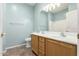 Bathroom with a double vanity and light blue walls at 29919 N Little Leaf Dr, San Tan Valley, AZ 85143