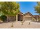 Attractive single-level home featuring desert landscaping, a two-car garage, and well-maintained yard at 29919 N Little Leaf Dr, San Tan Valley, AZ 85143