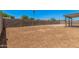 Spacious backyard with a privacy wall and a covered patio at 3056 N 68Th Ln, Phoenix, AZ 85033