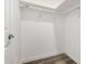 Walk-in closet with shelves and clothing racks for efficient organization at 3056 N 68Th Ln, Phoenix, AZ 85033