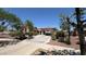 Beautiful single-story home featuring desert landscaping, a red tile roof, and a long driveway at 3063 N Heritage St, Buckeye, AZ 85396