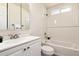 Bright bathroom with new vanity, fixtures, and tiled shower over tub at 3114 W Villa Maria Dr, Phoenix, AZ 85053