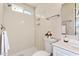 Bathroom featuring a clean, walk-in shower, updated fixtures, and a built in shower caddy at 3114 W Villa Maria Dr, Phoenix, AZ 85053