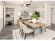 Inviting dining room with modern decor, stylish lighting, and a contemporary dining set at 3114 W Villa Maria Dr, Phoenix, AZ 85053