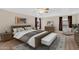 Serene bedroom features a large bed, soft lighting, and tasteful decor for a relaxing retreat at 3423 E Superior Rd, San Tan Valley, AZ 85143