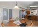 This dining room is adjacent to the kitchen, with a round wooden table and seating for four at 3905 E Derringer Way, Gilbert, AZ 85297