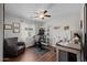 This home office includes a desk, shelving, and a comfortable chair with a window view at 3905 E Derringer Way, Gilbert, AZ 85297