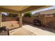 Outdoor patio with BBQ, a covered area and view of the fenced in backyard with gravel at 3905 E Derringer Way, Gilbert, AZ 85297
