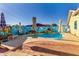 Private backyard showcasing a swimming pool, artistic wall decorations, and comfortable seating areas for outdoor enjoyment at 4013 E Delta Cir, Mesa, AZ 85206