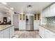 Bright kitchen featuring stainless steel appliances, granite countertops, and ample cabinet space, perfect for Gathering meals at 4013 E Delta Cir, Mesa, AZ 85206